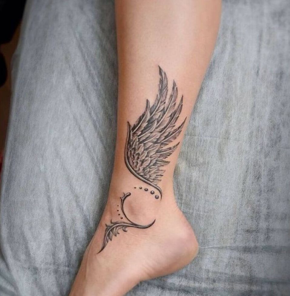 angel wings on back tattoo